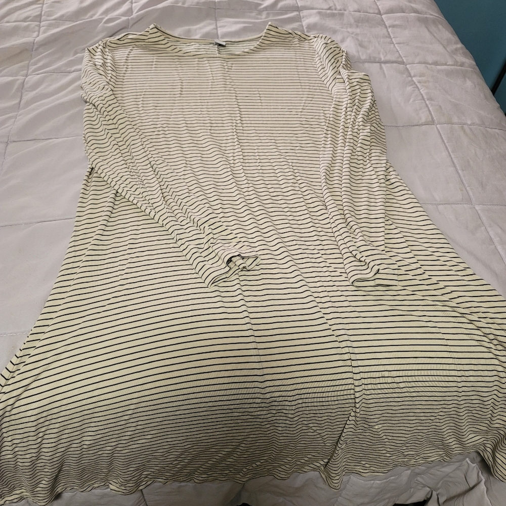 Long sleeve swing dress. Hits just at knee length. Ecru with navy pinstripes